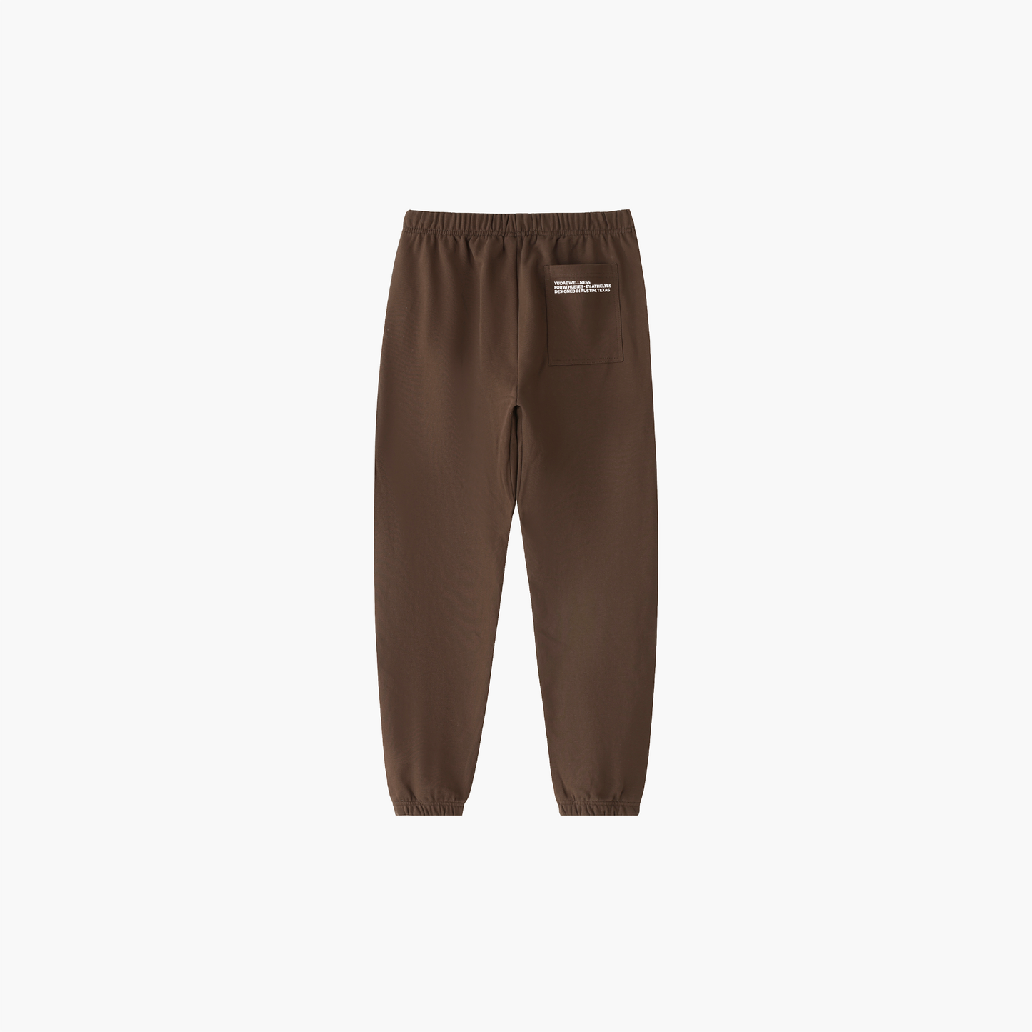 Brown sweatpants with a small logo on a white background